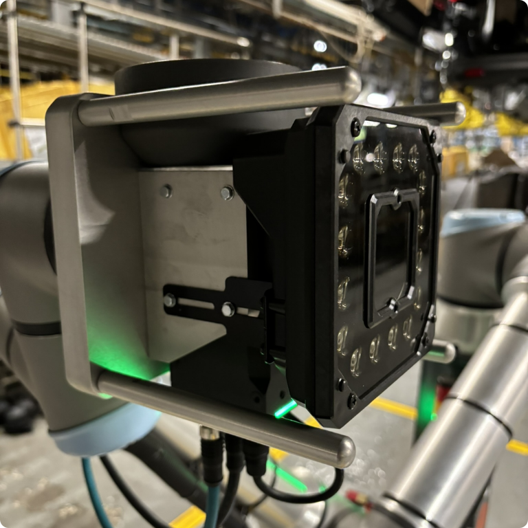 Manufacturing automation with vision camera